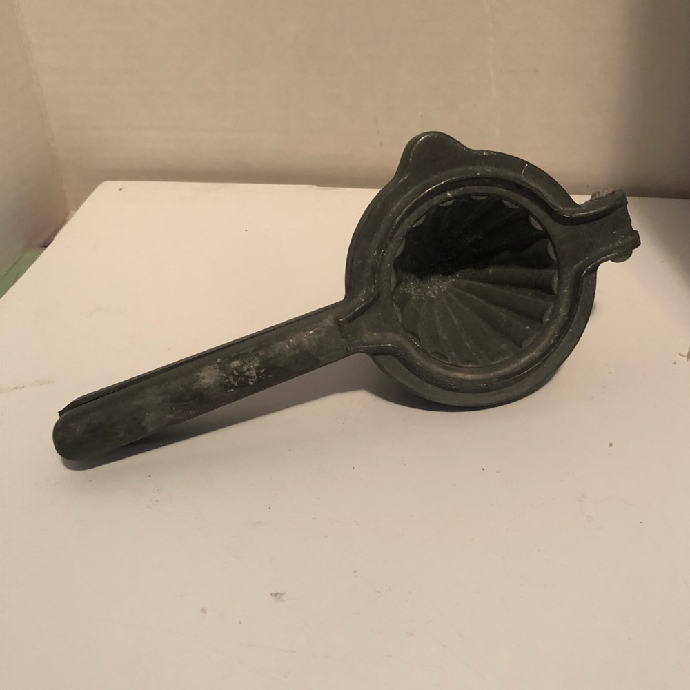 Vintage Metal Citrus Juicer for your farmhouse decor, man cave or bar. Used